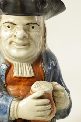 Lot 90 - A LATE 18TH/EARLY 19TH CENTURY PRATT TYPE TOBY JUG