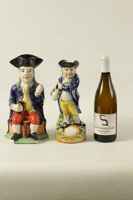 Lot 79 - A 19TH CENTURY STAFFORDSHIRE ‘ENGLISH SQUIRE’ TOBY JUG AND ANOTHER ‘HEARTY GOOD FELLOW’ TOBY JUG