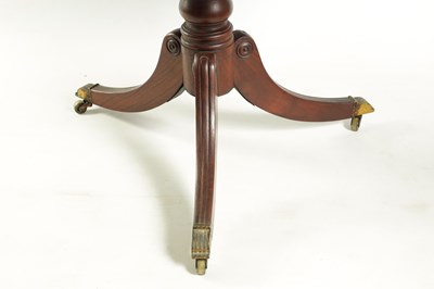 Lot 935 - A REGENCY FLAME MAHOGANY DRUM TABLE