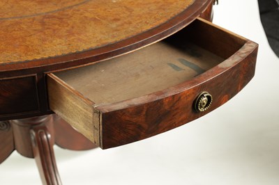 Lot 935 - A REGENCY FLAME MAHOGANY DRUM TABLE