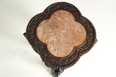 Lot 139 - A 19TH CENTURY CHINESE PROFUSELY CARVED HARDWOOD JARDINIERE STAND