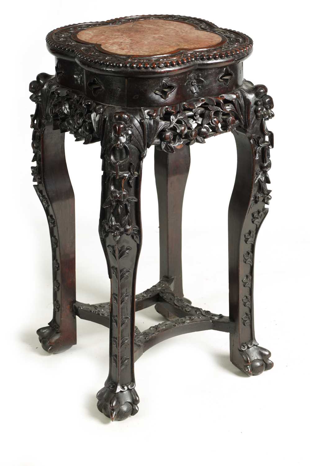 Lot 139 - A 19TH CENTURY CHINESE PROFUSELY CARVED HARDWOOD JARDINIERE STAND