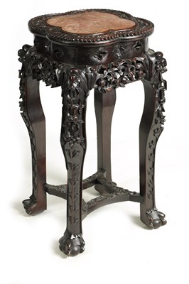 Lot 139 - A 19TH CENTURY CHINESE PROFUSELY CARVED HARDWOOD JARDINIERE STAND