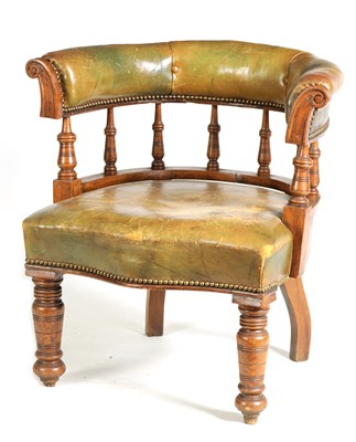 Lot 1066 - A LATE 19TH CENTURY OAK FRAMED LEATHER UPHOLSTERED LIBRARY CHAIR