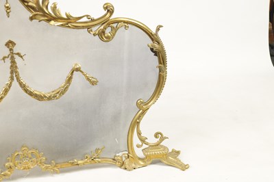 Lot 437 - A LATE 19TH CENTURY CAST BRASS FIRE SCREEN