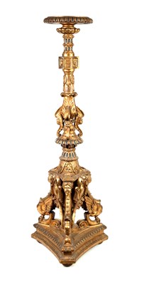 Lot 1033 - A LATE 19TH CENTURY CARVED GILT WOOD TORCHERE