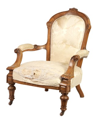 Lot 1079 - A LATE 19TH CENTURY OPEN ARM CARVED UPHOLSTERED WALNUT DRAWING ROOM CHAIR