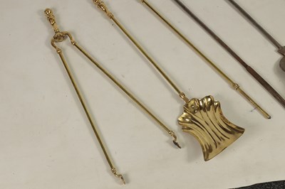 Lot 438 - TWO SETS OF BRASS AND STEEL FIRE IRONS