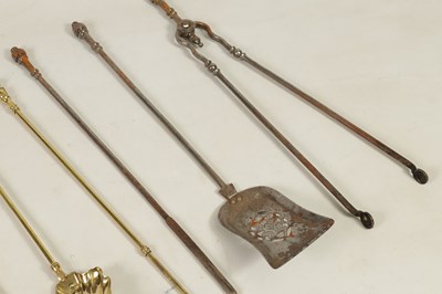 Lot 438 - TWO SETS OF BRASS AND STEEL FIRE IRONS