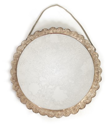 Lot 353 - A LATE 19TH CENTURY FINELY EMBOSSED SILVER CIRCULAR HANGING MIRROR - POSSIBLY TURKISH