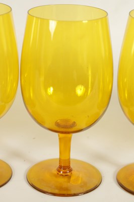 Lot 25 - A SET OF SIX URANIUM AMBER GLASS WINE GOBLETS