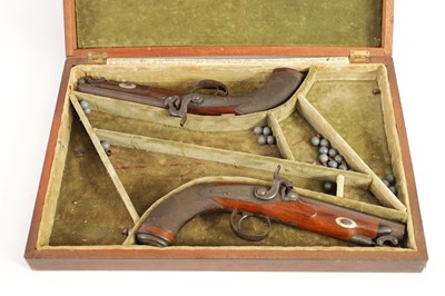 Lot 391 - A CASED PAIR OF EARLY 19TH CENTURY PERCUSSION PISTOLS BY MOORE, LONDON.