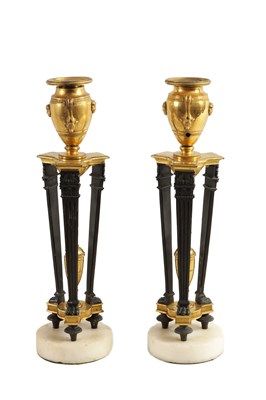Lot 537 - A PAIR OF REGENCY FRENCH EMPIRE BRONZE AND ORMOLU CANDLESTICKS