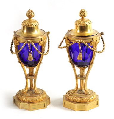 Lot 510 - A FINE PAIR OF REGENCY FRENCH ORMOLU AND BLUE GLASS REVERSIBLE CASOLETTES