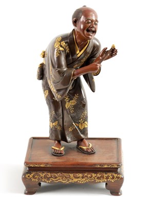 Lot 106 - A JAPANESE MEIJI PERIOD BRONZE AND GILT FIGURAL SCULPTURE SIGNED MIYAO