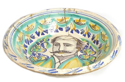 Lot 98 - A 17TH CENTURY SPANISH TERRACOTTA GLAZED CHARGER