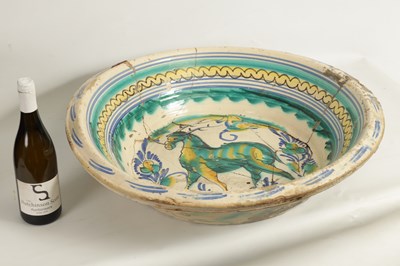 Lot 97 - A 17TH CENTURY SPANISH TERRACOTTA CHARGER