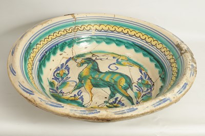 Lot 97 - A 17TH CENTURY SPANISH TERRACOTTA CHARGER