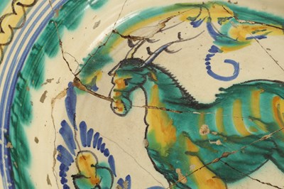 Lot 97 - A 17TH CENTURY SPANISH TERRACOTTA CHARGER