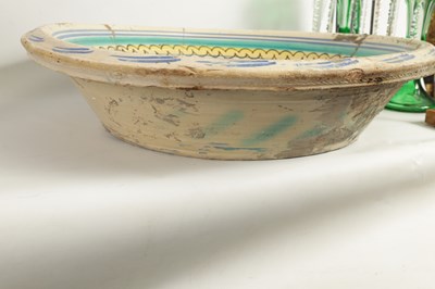 Lot 97 - A 17TH CENTURY SPANISH TERRACOTTA CHARGER