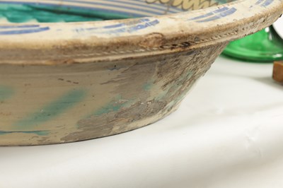 Lot 97 - A 17TH CENTURY SPANISH TERRACOTTA CHARGER