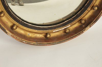 Lot 1370 - A REGENCY GILTWOOD CONVEX CIRCULAR MIRROR