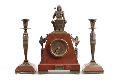 Lot 781 - A LATE 19TH CENTURY EGYPTIAN STYLE FRENCH BRONZE AND ROUGE MARBLE CLOCK GARNITURE