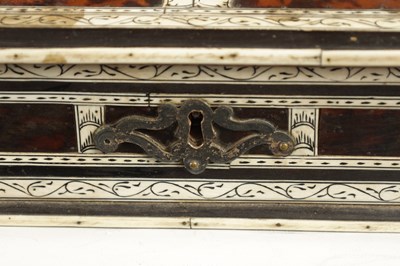 Lot 849 - AN 18TH CENTURY INDO PORTUGUESE TORTOISE SHELL AND IVORY VENEERED CASKET