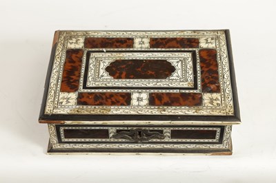 Lot 849 - AN 18TH CENTURY INDO PORTUGUESE TORTOISE SHELL AND IVORY VENEERED CASKET