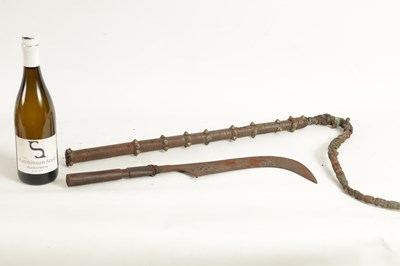 Lot 384 - A 19TH CENTURY AFRICAN SCYTHE AND WHIP