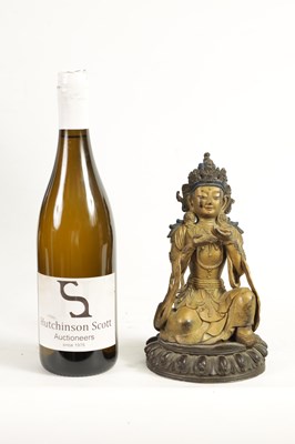 Lot 164 - AN EARLY GILT BRONZE TIBETAN BUDDHA