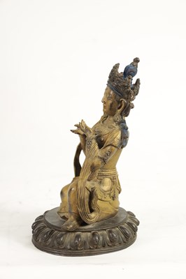 Lot 164 - AN EARLY GILT BRONZE TIBETAN BUDDHA