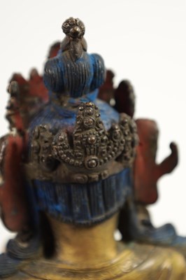 Lot 164 - AN EARLY GILT BRONZE TIBETAN BUDDHA