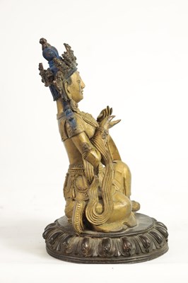 Lot 164 - AN EARLY GILT BRONZE TIBETAN BUDDHA