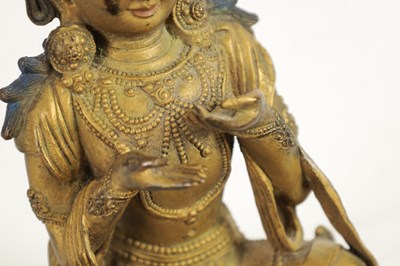 Lot 164 - AN EARLY GILT BRONZE TIBETAN BUDDHA