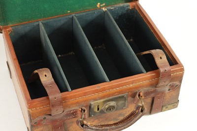 Lot 379 - A 19TH CENTURY LEATHER BOUND CARTRIDGE CASE