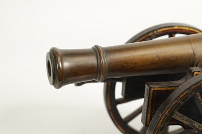 Lot 389 - A 19TH CENTURY BRONZE AND CAST IRON STARTING CANNON