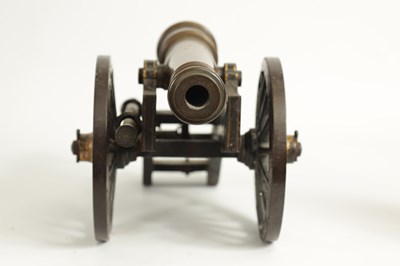Lot 389 - A 19TH CENTURY BRONZE AND CAST IRON STARTING CANNON