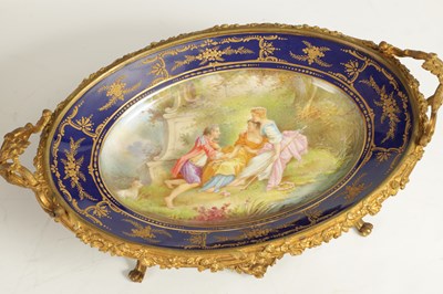 Lot 55 - A LATE 19TH CENTURY SERVES STYLE OVAL ORMOLU MOUNTED CENTREPIECE