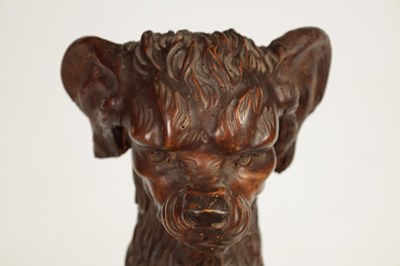 Lot 1130 - A 19TH-CENTURY BLACK FOREST CARVED WALNUT STICK STAND FORMED AS A BEGGING DOG