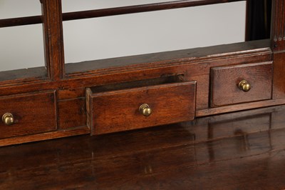 Lot 818 - AN EARLY 18TH CENTURY OAK 'DOG KENNEL' DRESSER AND RACK