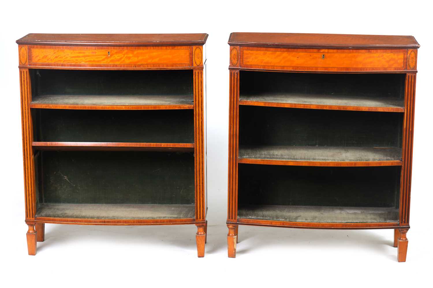 Lot 943 - A FINE PAIR OF GEORGE III FIGURED SATINWOOD AND KINGWOOD CROSS-BANDED BOW-FRONT OPEN BOOKCASES