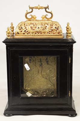 Lot 779 - WILLIAM SPEAKMAN, LONDON A WILLIAM AND MARY EBONISED GILT BRASS MOUNTED BASKET TOP BRACKET CLOCK