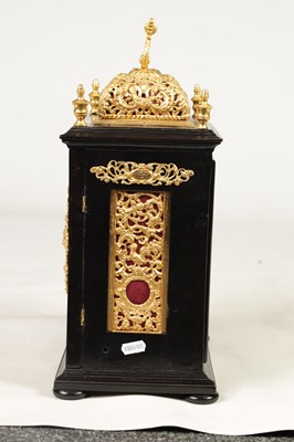 Lot 779 - WILLIAM SPEAKMAN, LONDON A WILLIAM AND MARY EBONISED GILT BRASS MOUNTED BASKET TOP BRACKET CLOCK