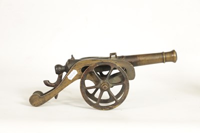 Lot 365 - A 19TH CENTURY BRONZE STARTING CANNON