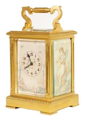 Lot 841 - A LATE 19TH CENTURY FRENCH GILT BRASS AND IVORY PANELLED REPEATING CARRIAGE CLOCK