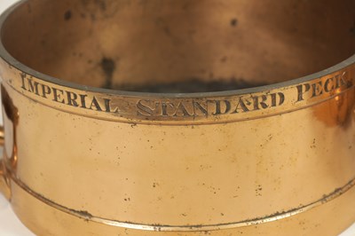 Lot 495 - A SET OF THREE 19TH CENTURY IMPERIAL STANDARD CAST BRASS GRAIN MEASURES BY BATE LONDON