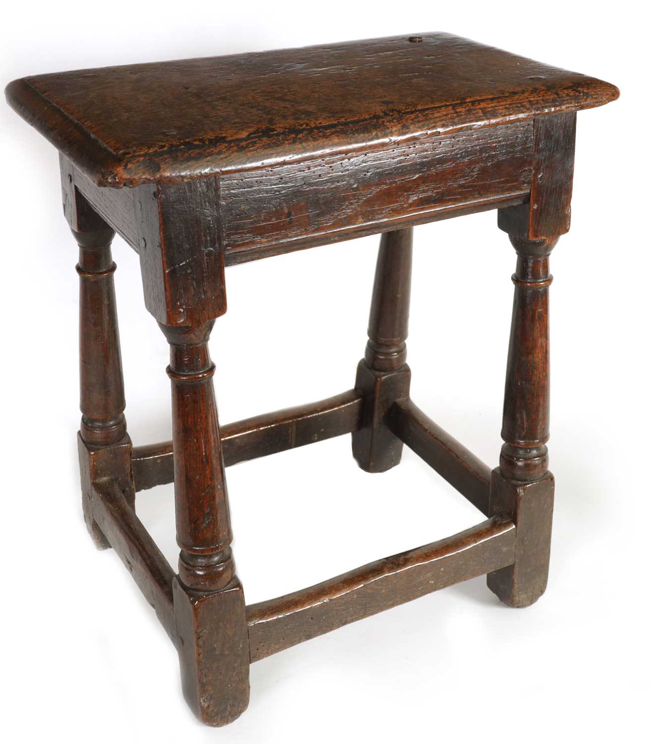 Lot 911 - A LATE 17TH CENTURY OAK JOINT STOOL