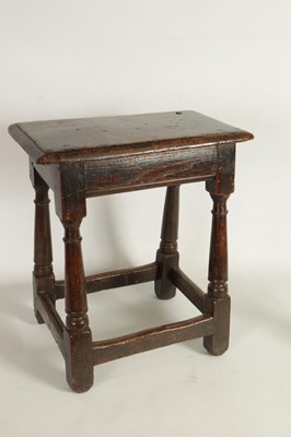 Lot 911 - A LATE 17TH CENTURY OAK JOINT STOOL