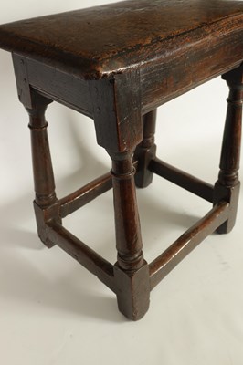 Lot 911 - A LATE 17TH CENTURY OAK JOINT STOOL